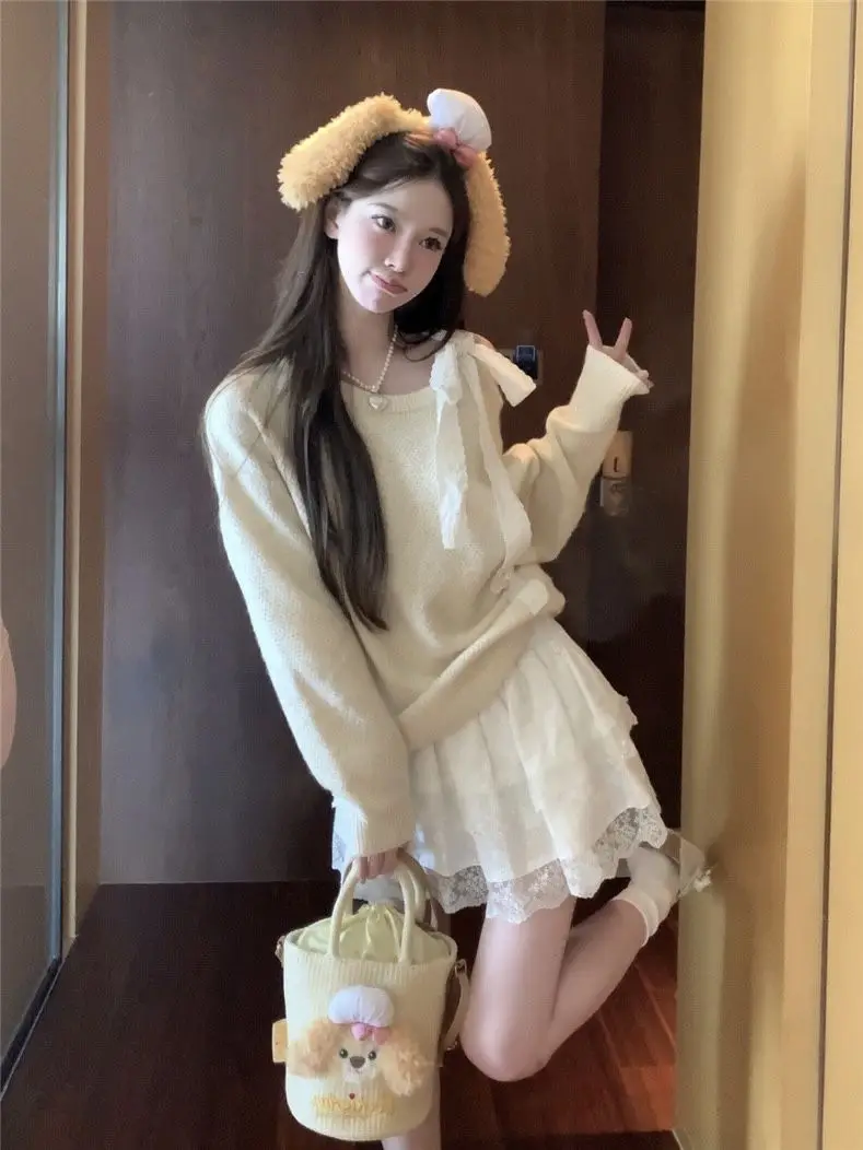 

Девичий розовый вязаный топ с открытыми плечами и женский короткий свитер на шнуровке в корейском стиле