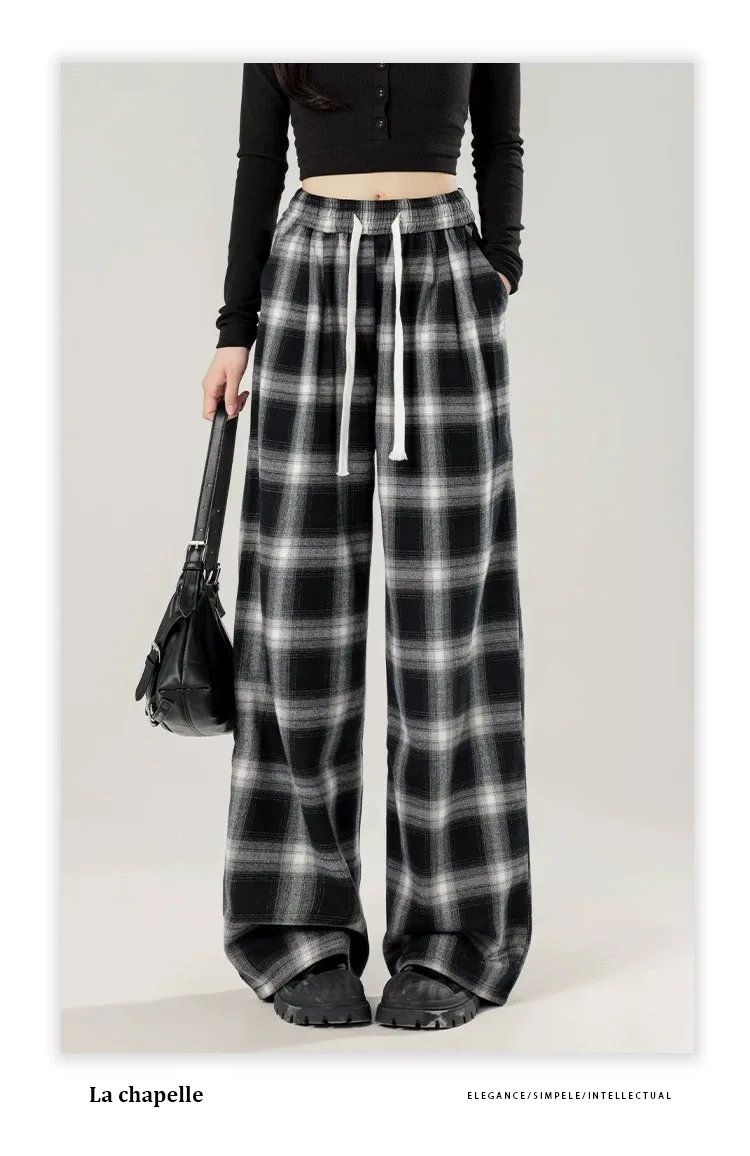 女性用の特大の黒い市松模様のスウェットパンツ,だぶだぶのカジュアルパンツ,伸縮性のあるウエスト,ポケット,学生,ユニセックス,ヒップホップ,ルーズフィット,ファッション