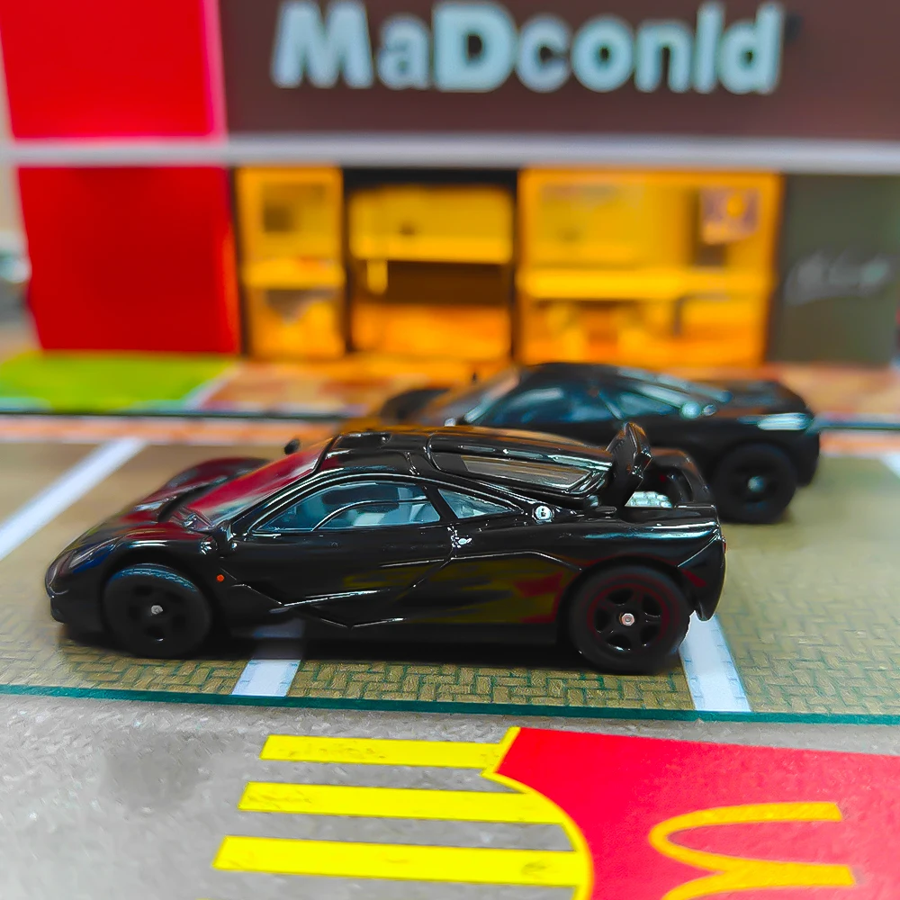 รถโมเดลไดแคสต์ Xcartoys x POP RACE 1:64 F1 สีดำเจ็ท จำนวน 2 คัน (ไม่มีกล่อง)