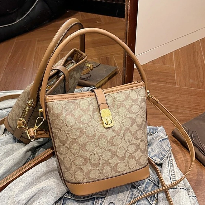 

Новые женские сумки на осень и зиму 2025: сумка-ведро с цветочным принтом, универсальная сумка на одно плечо, сумка через плечо