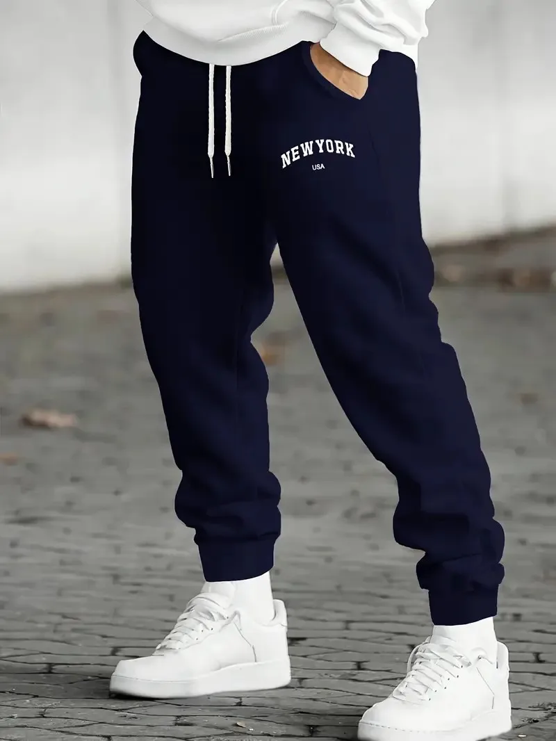 

The new men's trousers for Spring and Autumn 2025 are comfortable soft casual and simple with letter prints