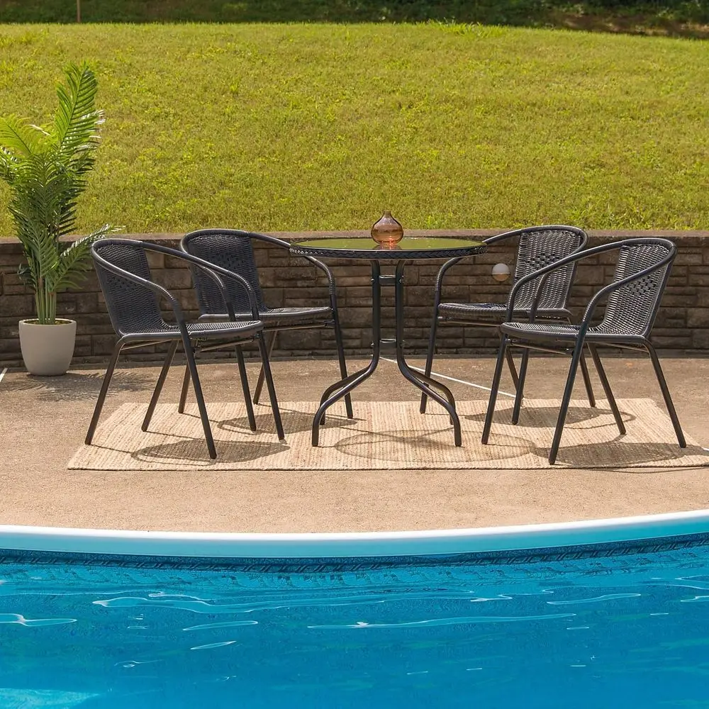 

Lila 28 Round Glass Metal Table with Black Rattan Edging and 4 Black Rattan Stack Chairs