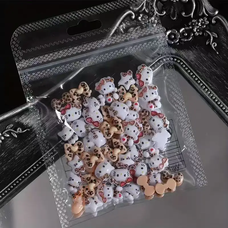 50個/パック サンリオ レオパード樹脂製 ハローキティ ネイルアートチャーム、漫画キティ猫リボンラインストーン ラブ3DネイルジュエリーDIY