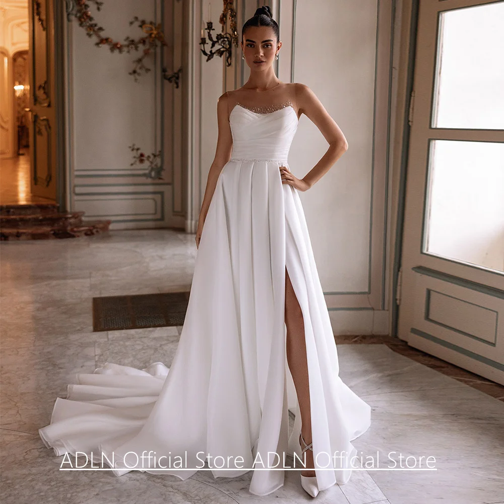 Organza ชุดแต่งงาน Vestidos De Novia ที่กําหนดเองที่ถอดออกได้ปิดไหล่แขนกุดจีบประดับด้วยลูกปัดสายแยกชุดเจ้าสาว