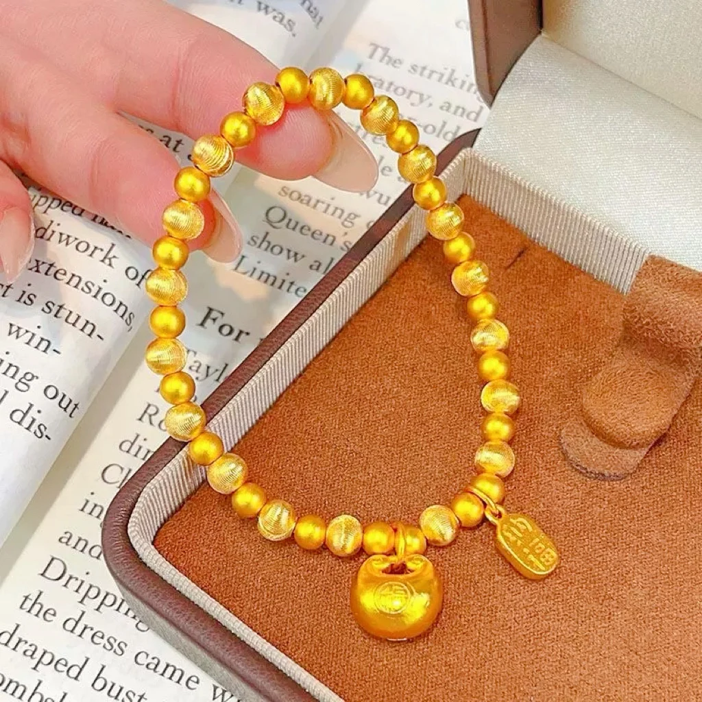 

Women's Brushed Cat's Eye Lucky Bead Bracelet, 24K Gold, AU999 "Stability" engraving with coin motifs, subtle professional charm