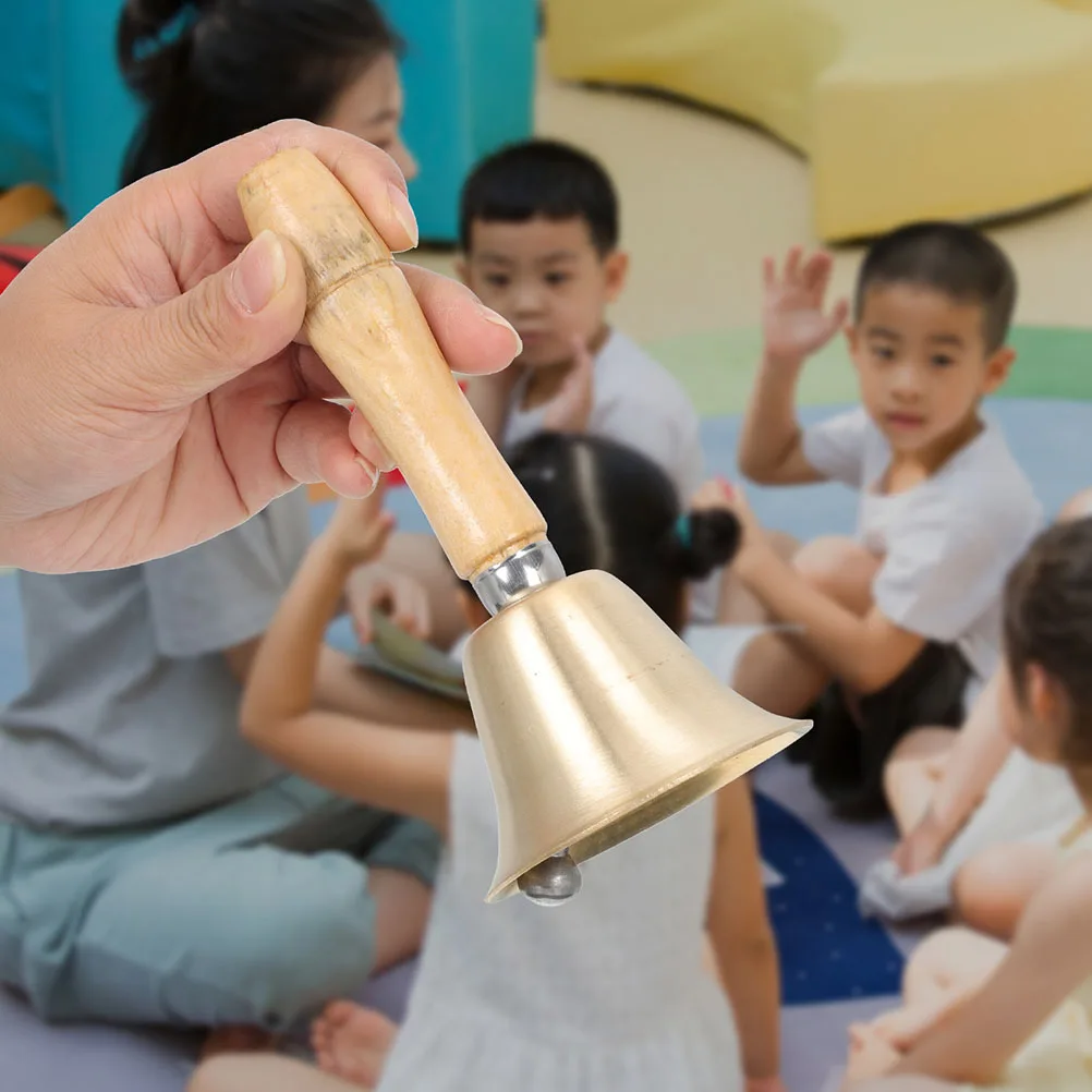 

Solid Brass Loud Hand Call Bell with Wooden Handle Handheld Ringing Bell for Outdoor Camping Safety