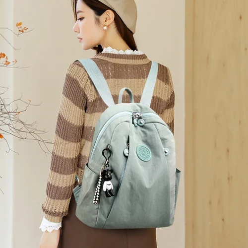 Imagen 2 del producto Nueva mochila impermeable de tela de nailon para mujer, mochilas escolares de moda para chicas adolescentes, bolso de hombro de alta calidad, mochila de viaje 2024