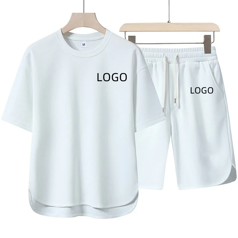 

2 pieces per set - Men's summer loose-fitting T-shirts (short sleeves) with elastic cuffs, loose hems, and wide trouser legs. A
