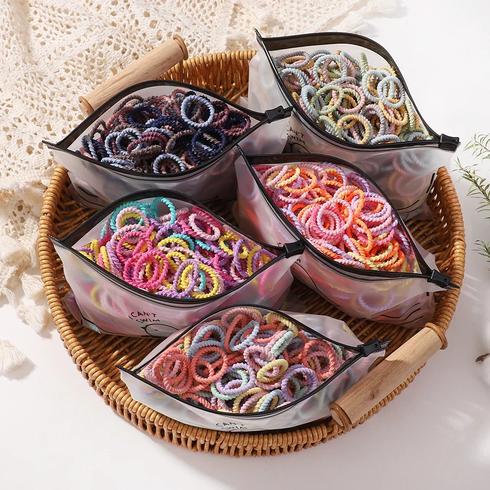 100 Stück/Tasche elastische Haar bänder Mädchen Baby Haarschmuck Kinder haar Ring Kopf Seil Haar gummis Kopf bedeckung ohne Flaschen