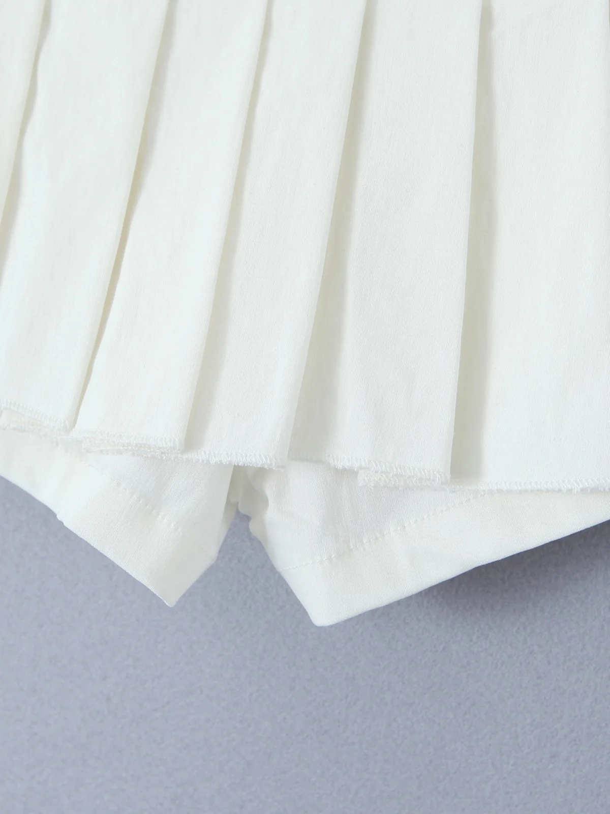 Sexy lage taille plooirok dubbellaags anti-licht bla wit ort rok orts rok hot girl street sle pure kleur