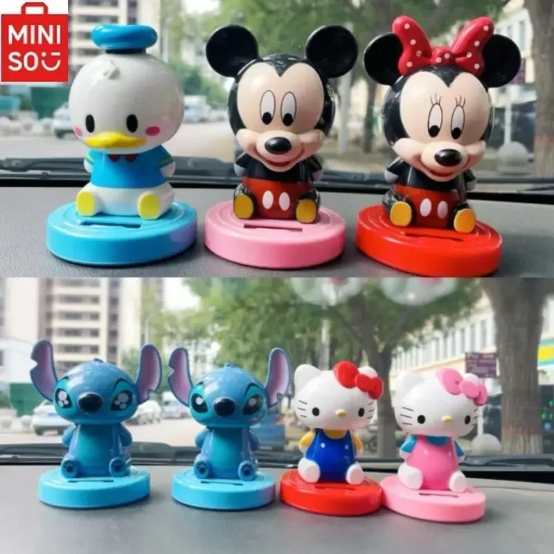 

MINISO HelloKitty Car Solar Shaking Head Ornaments Cartoon Disney Mickey Minnie Stitch Navy Duck Couple Car Cute Decorations