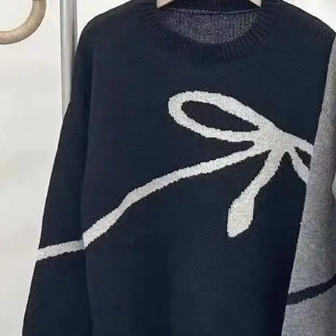 2025 ربيع جديد طويل الأكمام محبوك قميص المرأة فضفاضة القوس الكتف مقنعين سترة أعلى