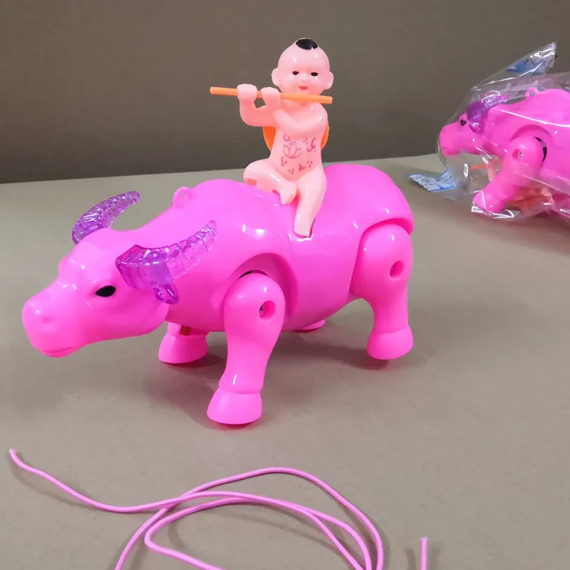 Kids Electric Toys Cartoon Cute Cow The Child Who Plays The Flute Pull-wire Walking Toy With Light Music Small Animal Kids Gifts