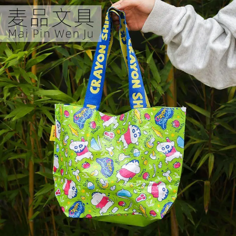 

Crayon Shin Chan Kawaii Anime Handbag Bandai Cartoon Cute Small Sized Shopping Bag Large Capacity Storage Bag Woven Bag Around