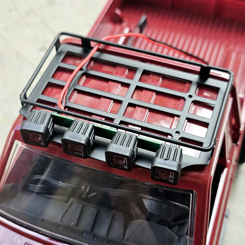 Shiny LED Light-Embellished MN82 Metal Luggage Carrier: Essential Roof Rack Upgrade for RC Model Cars.
