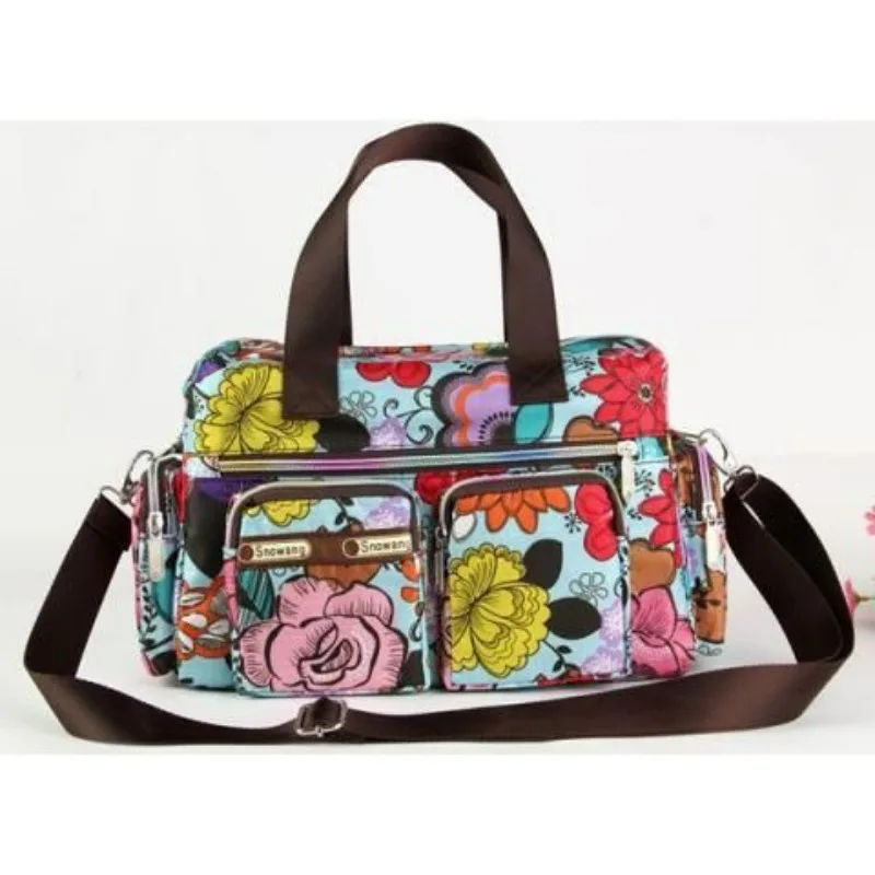 The 2025 New Waterproof Hand-held Crossbody Travel Bag Fashionable Lightweight Multi-layered with Multiple Pockets Mom's Travel