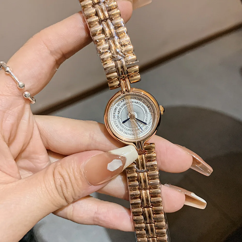 

Women's bracelet small goldwatchround dial design twohand minimalist women's watch fashionable quartz watchtrendy women's watch.