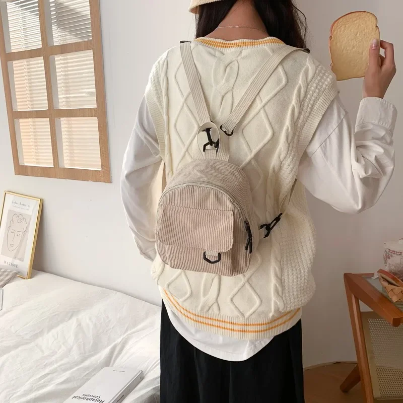 Mini mochila Ins supercaliente y Linda OL, bolsa de maquillaje pequeña con textura de terciopelo a rayas, mochila versátil para estudiantes