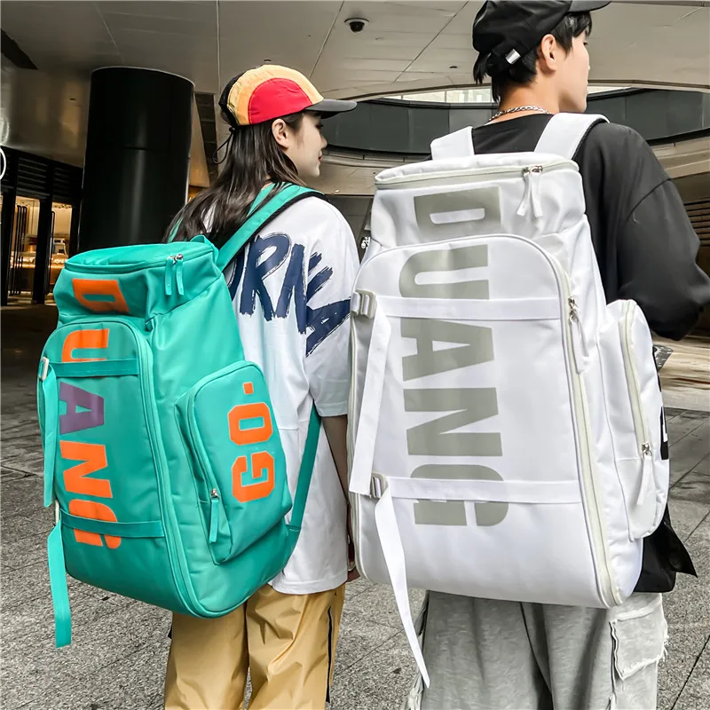 Schoolbag cool large capacity backpack mountaineering travel backpack skateboard veneer men's bag dry wet separation fitness bag
