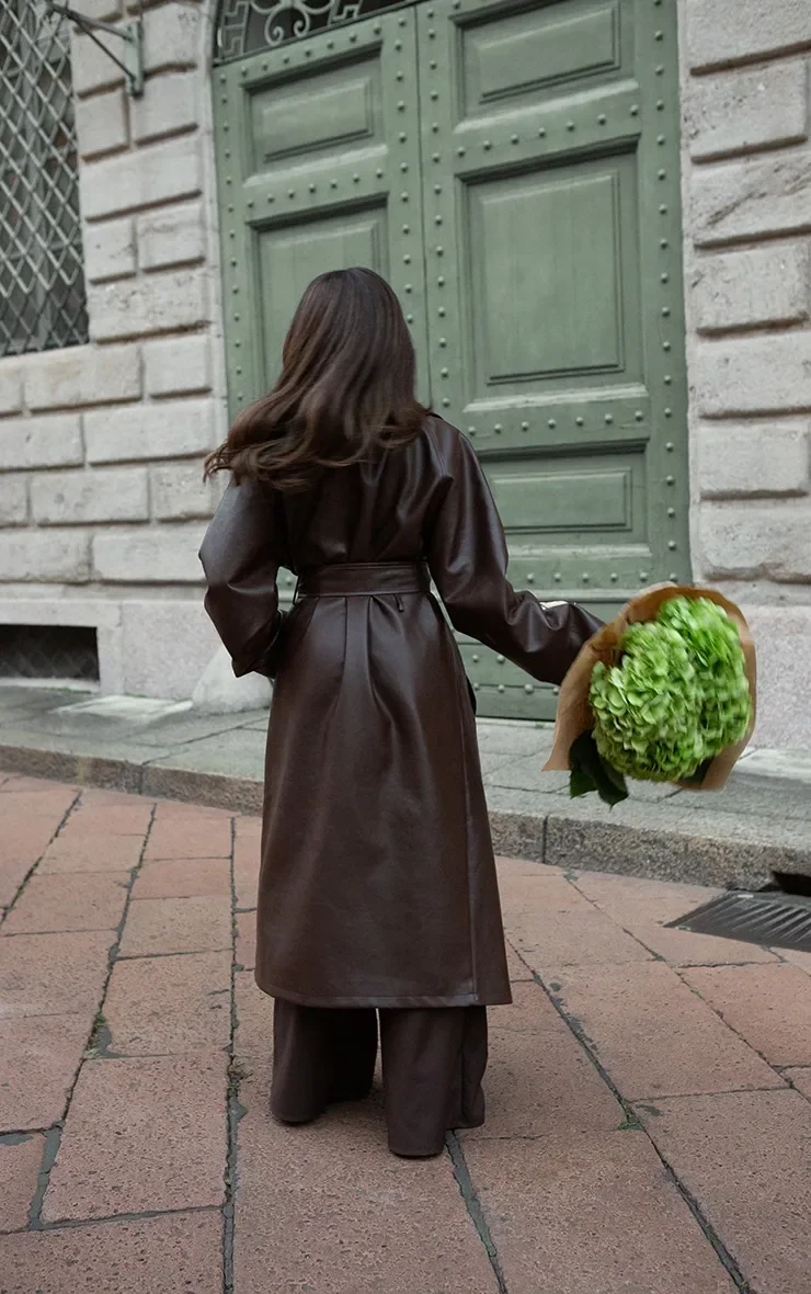 المرأة شيك الدانتيل يصل معطف جلد عادية التلبيب الخصر Cinching واحدة الصدر سترات طويلة موضة 2025 سيدة التنقل اليومي أبلى