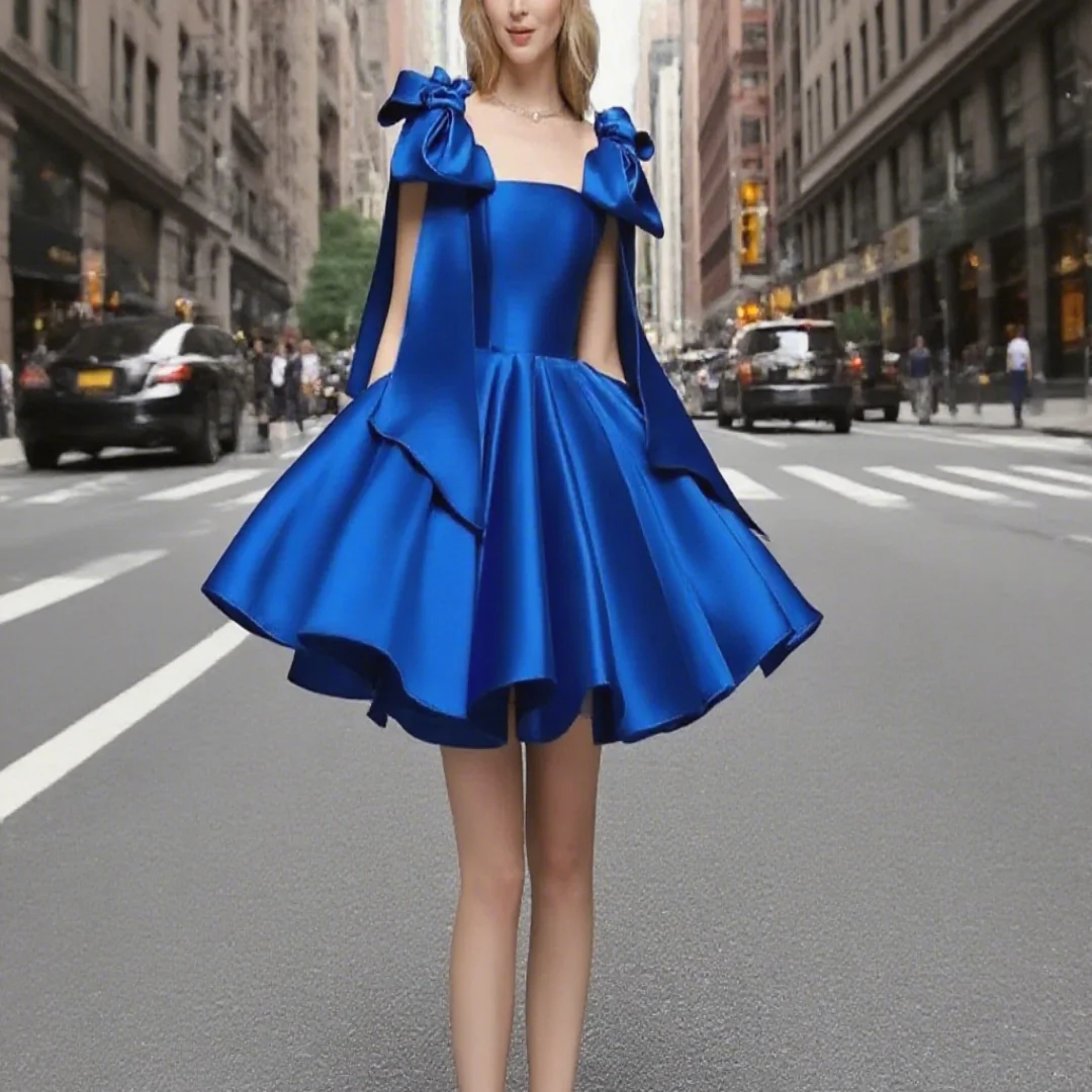 

Blue short-style ball gown with bow-shaped shoulder straps and satin fabric, custom-made for a lady's birthday dress