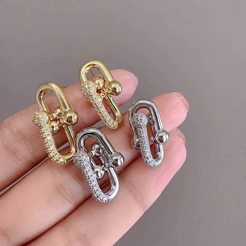 European and American retro light luxury design, zircon double ring metal buckle, U-shaped simple and niche earrings for women