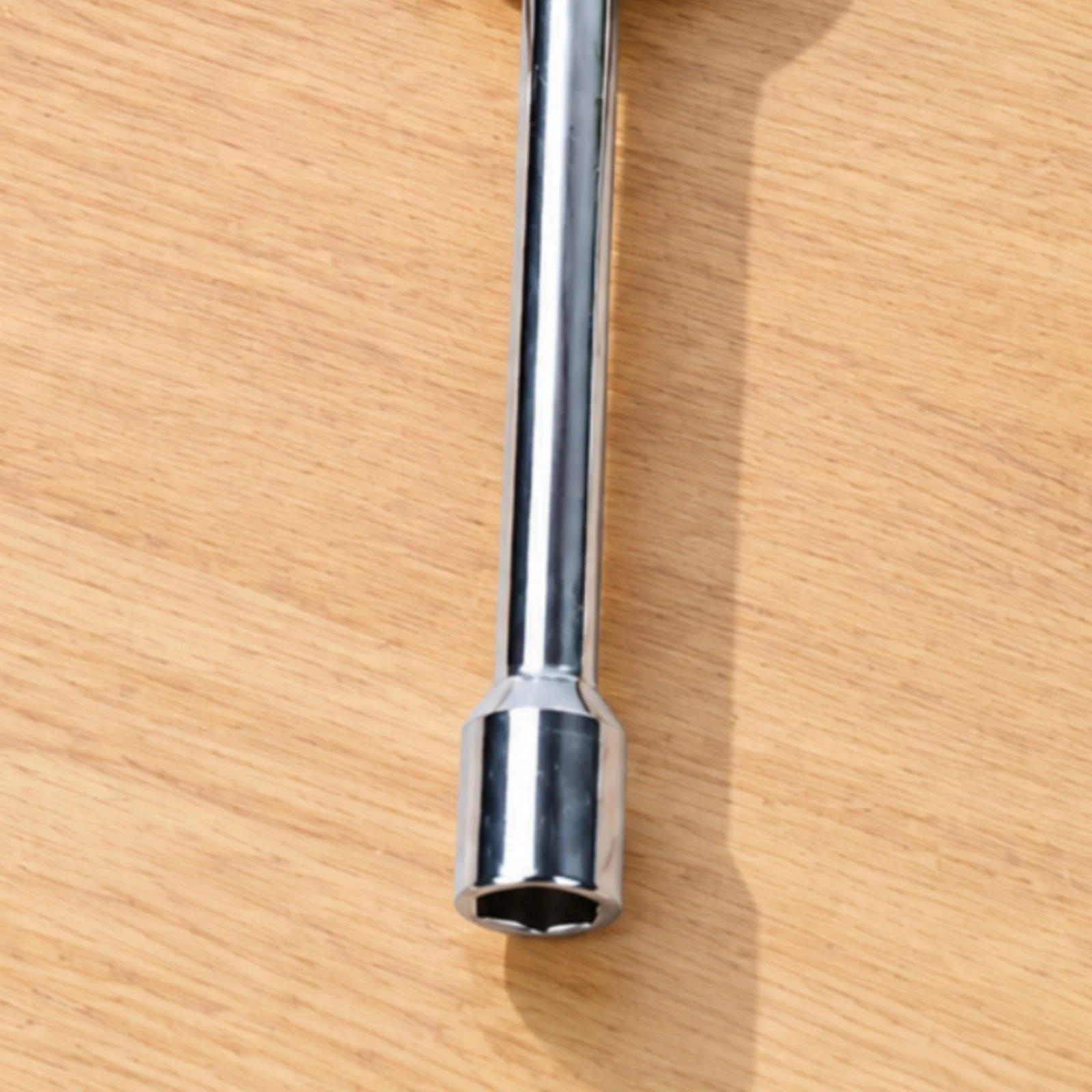 Sturdy Cross Type Tire Wrench with Textured Shafts and Retaining Clip for Secure Grip on Oily or Gloved Hands