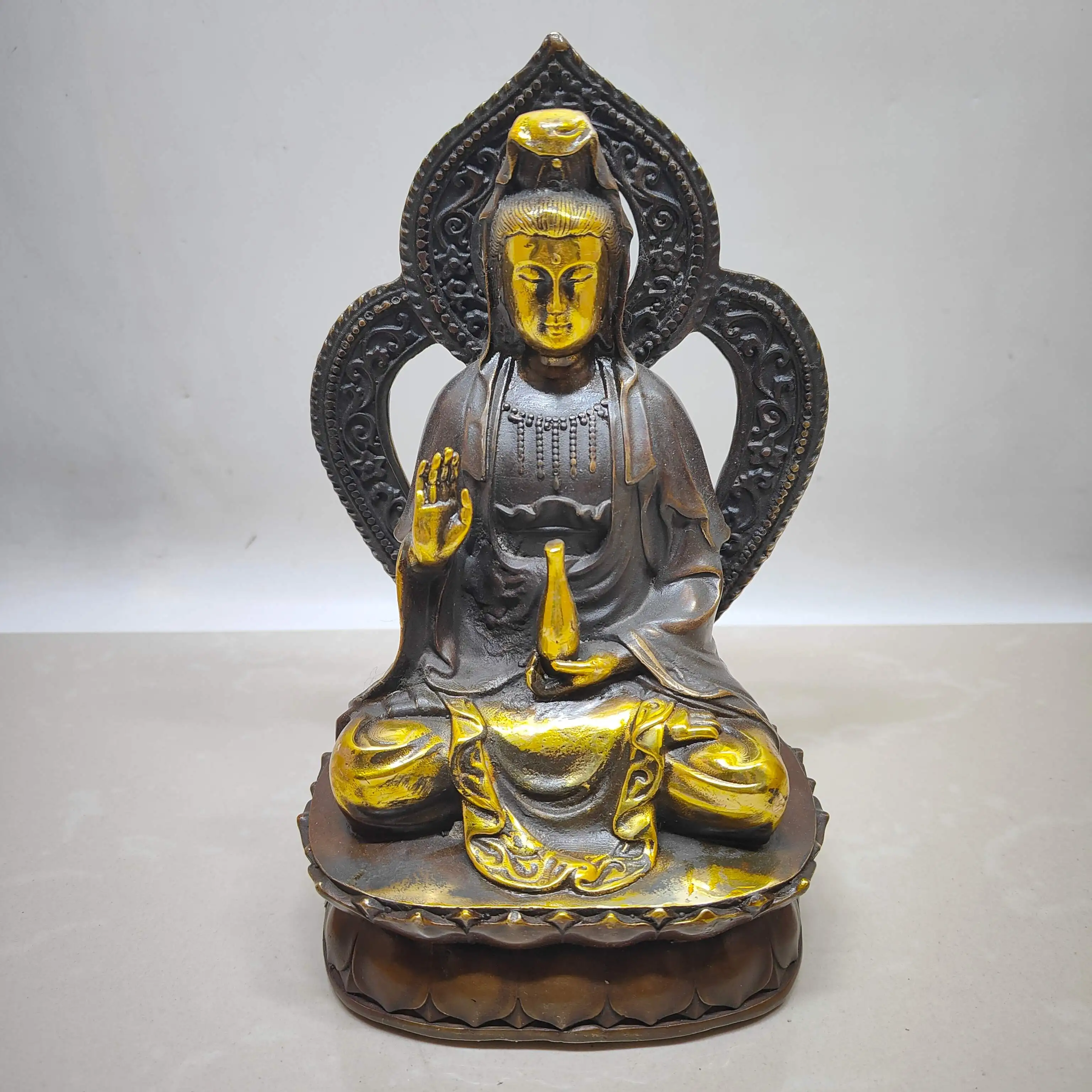 A backlit Guanyin Bodhisattva statue made of brass imitation purple copper gilded with antique craftsmanship.,Free shipping