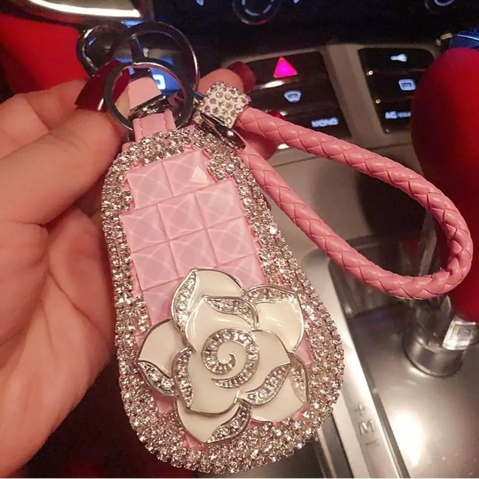 Universal rhinestone car key bag car key protective sleeve men and women pendant leather hair ball rope creative personality bag