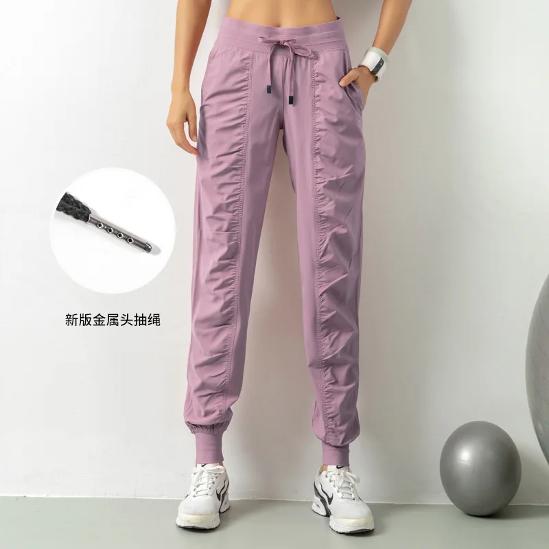 Pantaloni sportivi larghi per le donne pantaloni dimagranti ad asciugatura rapida leggings fitness da corsa casual pantaloni da yoga traspiranti set