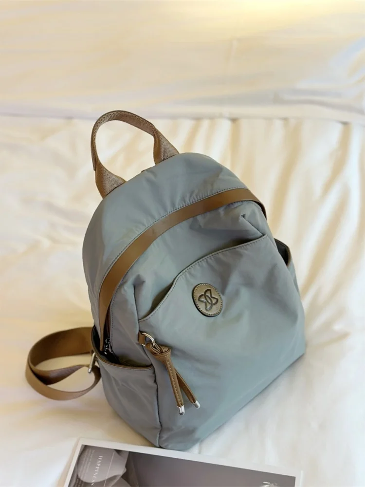 korean-style-women's-backpack-2026-new-light-climbing-bag-commuting-travel-computer-bag-soft-handle-internal-partition