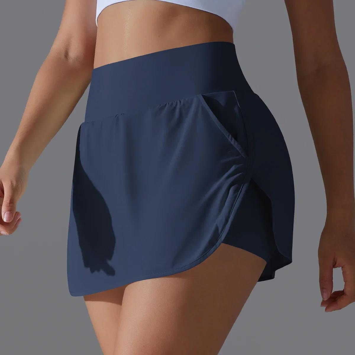 Culotte de sport taille haute pour femme, doublure anti-lumière, jupe à séchage rapide, adaptée à la course à pied, yoga, fitness, tennis