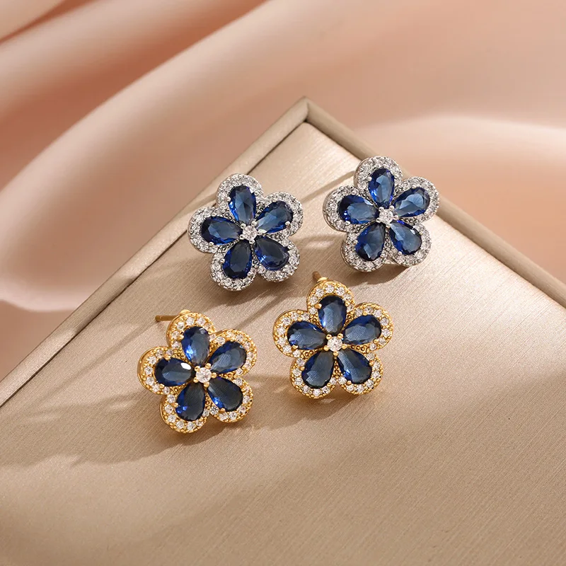 

Серьги-гвоздики в стиле ретро с синим цирконом и цветком, выберите европейскую и американскую моду, индивидуальность, легкая роскошь и изысканный шарм.
