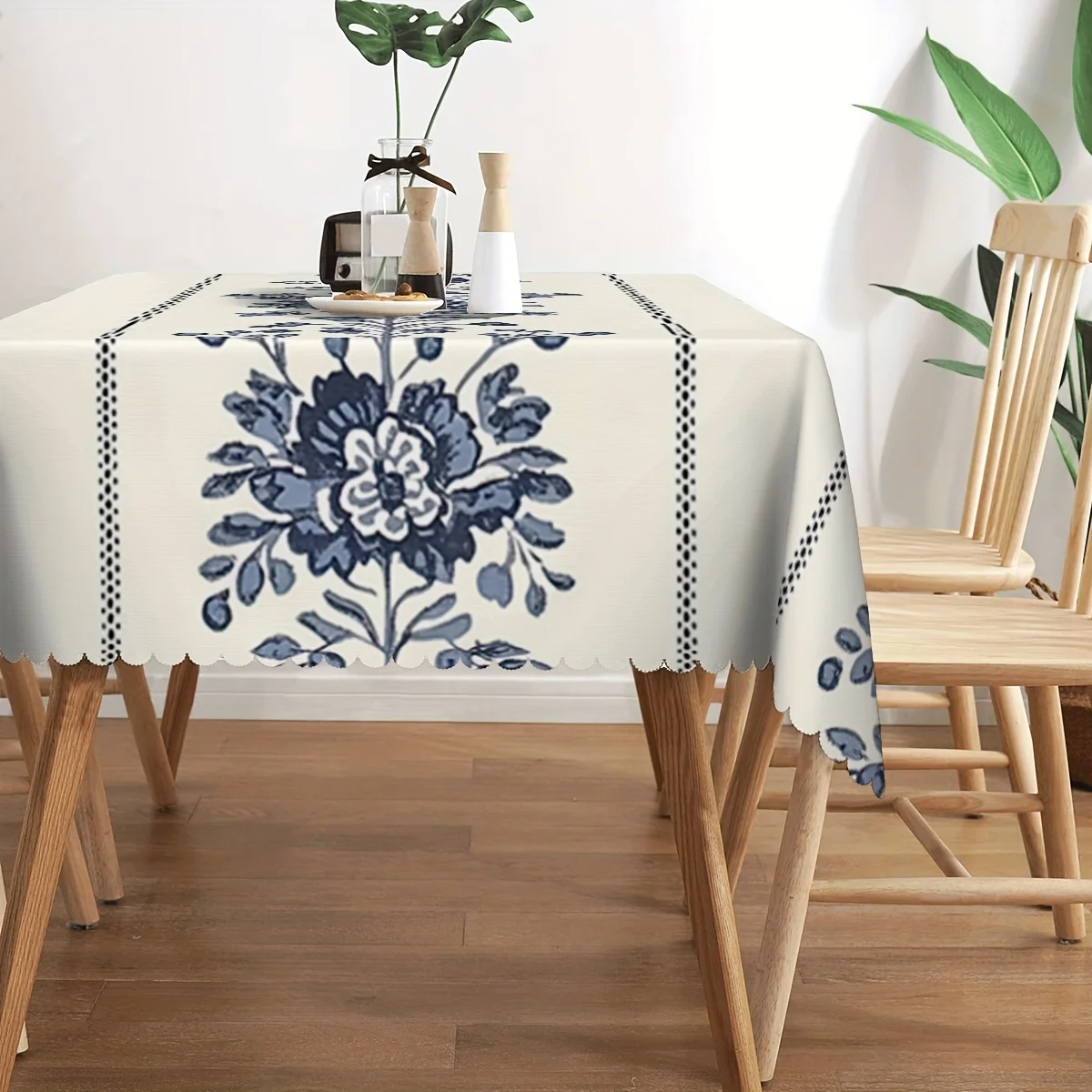 Elegant blue printed rectangular tablecloth with a fan-shaped edge, made of twill polyester.