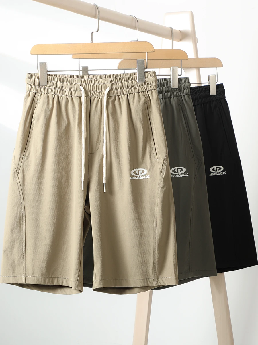 

Мужские летние повседневные эластичные дышащие шорты с прямыми штанинами, впитывающие пот, модные, для ежедневной носки, молодежные, стильные.