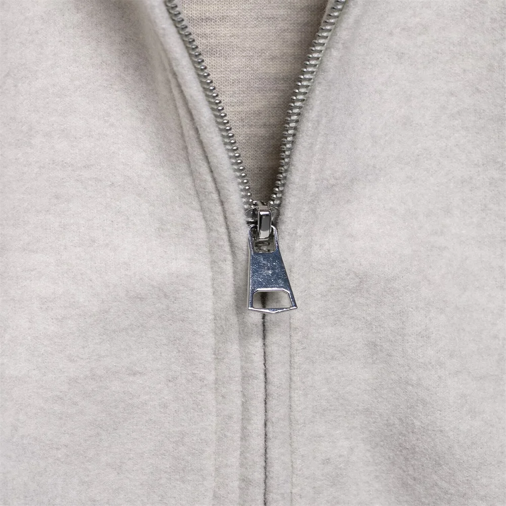 Jesienna nowa kolekcja odzieży damskiej, osobowość i styl, elegancka kurtka z klapami, wełniany płaszcz zapinany na zamek.