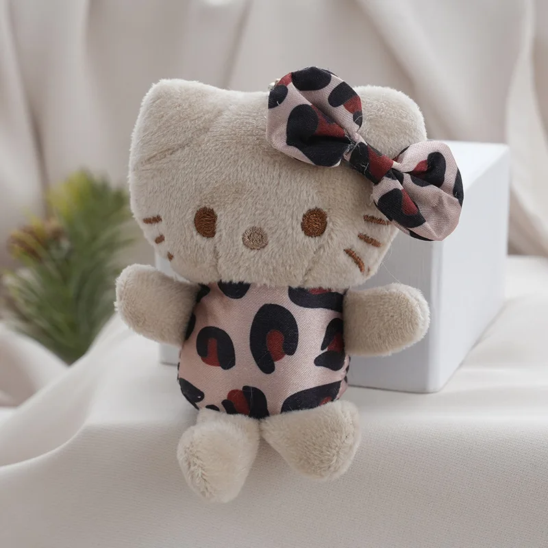 9CM サンリオ漫画ヒョウ猫ぬいぐるみキーホルダーかわいい女の子のバックパックアクセサリー Juguetes Para Niños Novedosos クリスマスギフト