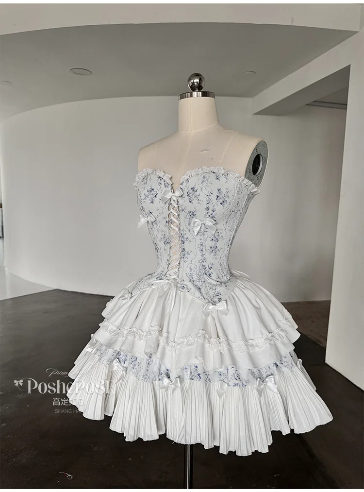 مجموعة تنورة ذات ثنيات علوية بدون أكمام على شكل فيونكة من الدانتيل الحلو بطباعة عتيقة تتضمن عصابة رأس + إكسسوار للرقبة + سوار