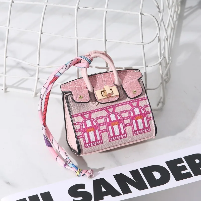 1pcs fashion Joker Mini Tide printing house coin purse portable headset change storage bag pendant, multi-functional bag