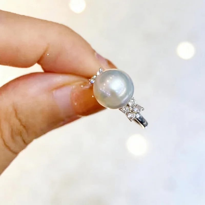 

Gorgeous pair of 11-12mm natural South Sea round white pearl rings with 14K gold plating