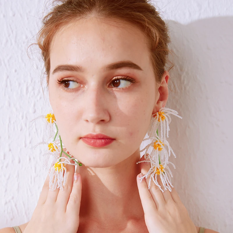 Hand-beaded long earrings Exaggerated white Daisy petals fringe earrings for female niche temperament holiday style earrings