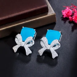 CWWZircons Popular Light Blue CZ Stone Paved Geometric Cute Bowknot Drop Earrings for Ladies Fashion Korean Style Jewelry CZ339