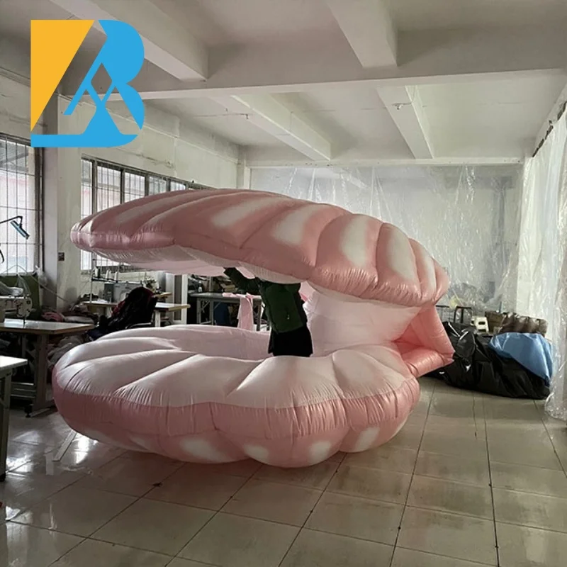 La grande festa a tema Royal Ball personalizzata illumina il guscio gonfiabile del mare per i giocattoli decorativi dell'ingresso sul palco