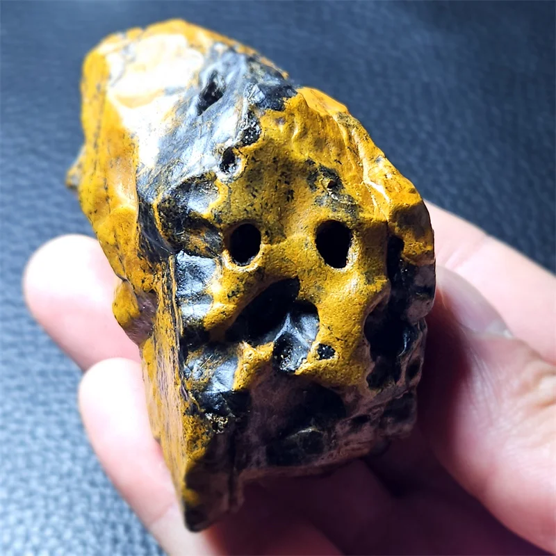 

Rare black and yellow natural raw stone Gobi Grimace Stone Reiki Healing witchcraft offers home decorations for Christmas gifts