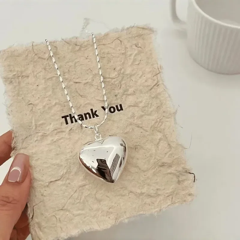 Copper-plated platinum long necklace niche design three-dimensional big love sweater chain stacked necklace high-end sweater
