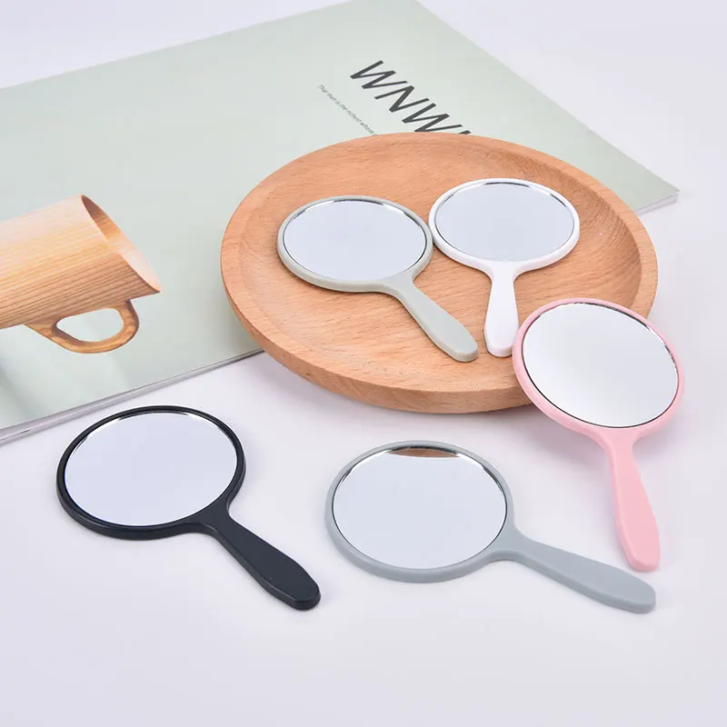 Miroir de courtoisie rond avec poignée, outil cosmétique pour déterminer le maquillage, main, 1 pièce