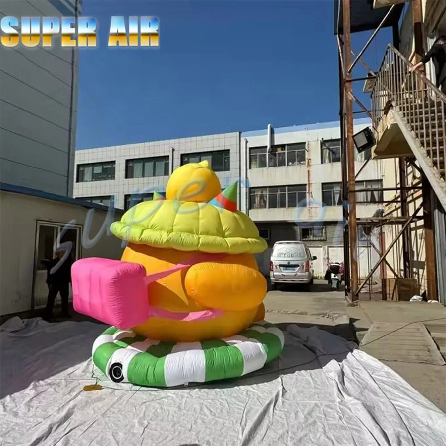 Ładny, piękny, ogromny, dmuchany maskotka, model kreskówkowy z torbą do dekoracji.