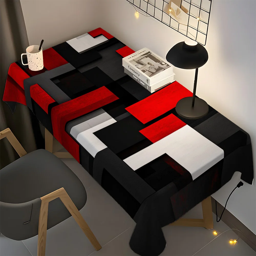 A single-color geometric tablecloth, featuring a red and black block pattern design, creates a warm atmosphere.zyc
