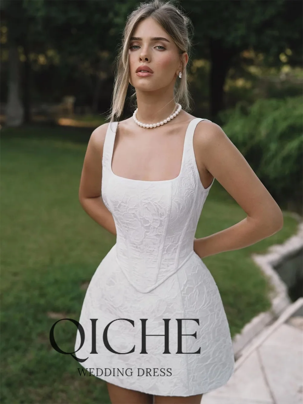 QICHE Cinched Waist Textured Fabric Corset Style Mini Dress Structured Bodice White Lace Dress Summer Bridal Shower Outfit 2026