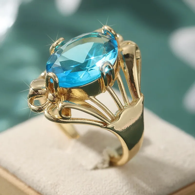 Wunderschöner Eingelegter Meerblauer CZ Damenring Trendiger Goldfarbener Handgravierter Hohler Alltags- und Partyschmuck Jubiläumsgeschenk – Detail 2
